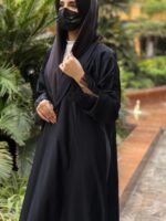 Crepe abaya with long cuts and elegant ruffles on the sleeves. With Tarha. Dark gray (available in several colors)