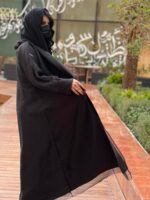 Luxurious black layered wrap abaya made of chiffon and organza. With Tarha